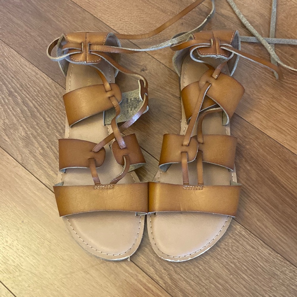 Strappy lace up leather sandals